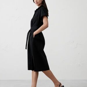 Solid Black shirt dress with belt two pockets front
